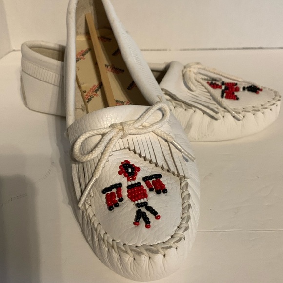 Minnetonka Shoes - Minnetonka soft sole Moccasin, white never worn.